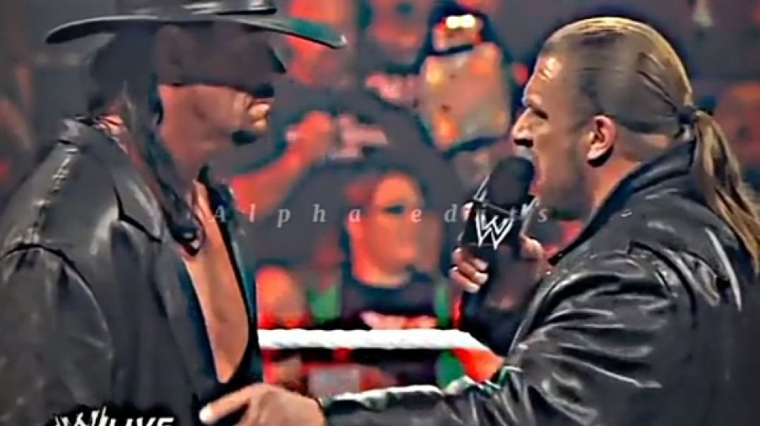 Triple H confronts the Undertaker